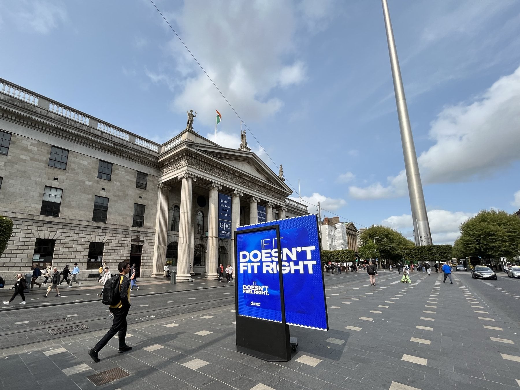 A Durex panel on O’Connell Street in front of the GPO, with the Spire behind it.
