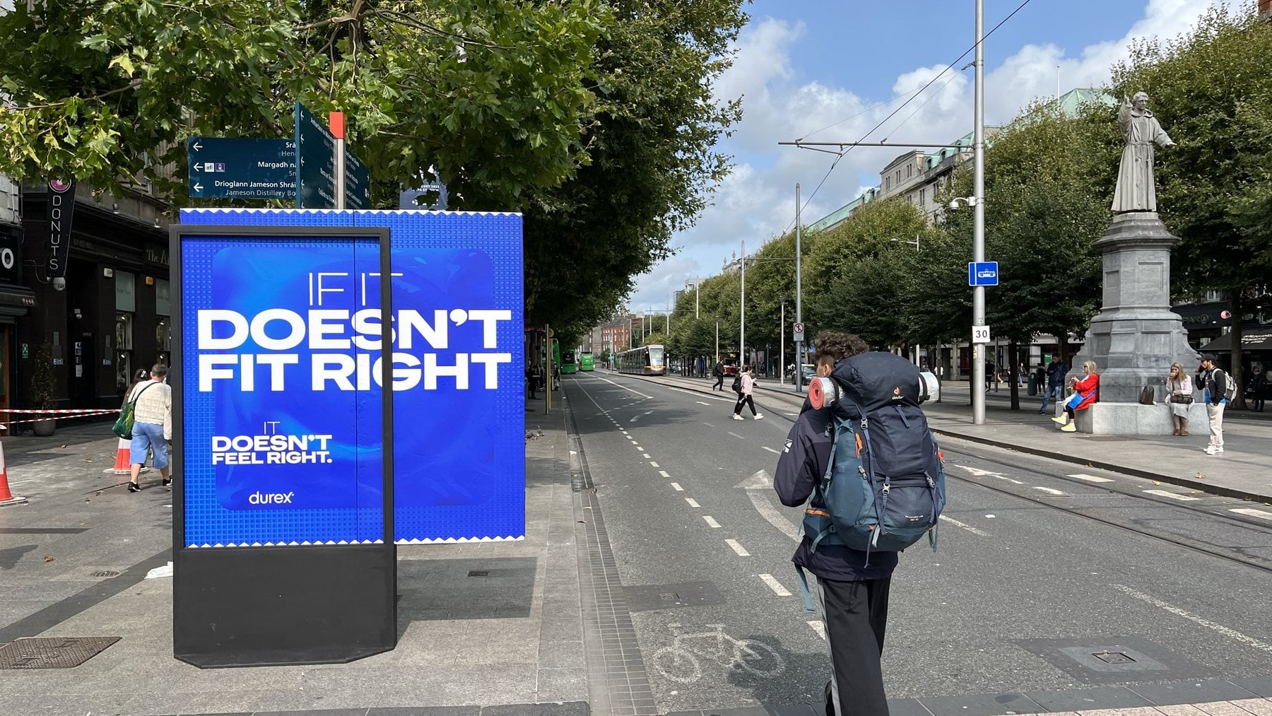 A Durex panel on O’Connell Street, Dublin, a condom graphic bursting out of the frame, under the line If it doesn’t fit right, it doesn’t feel right.