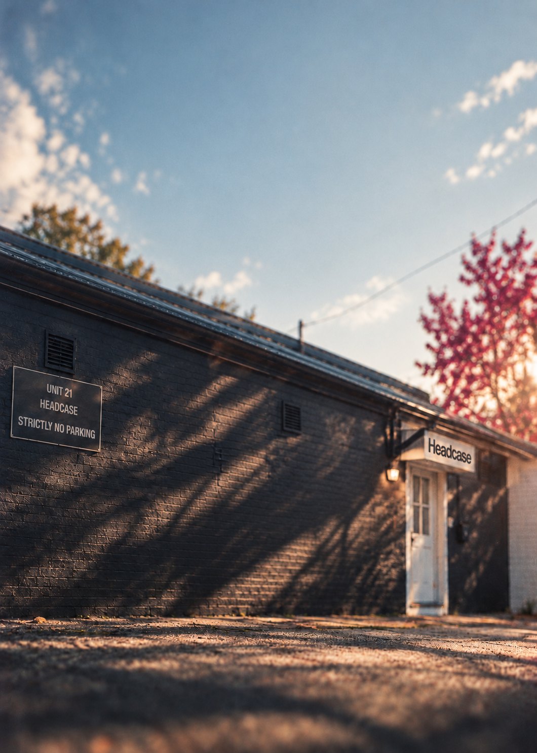 The Headcase studio at Unit 21, Harold's Cross, in evening sun. A sign on the brick reads Unit 21, Headcase.