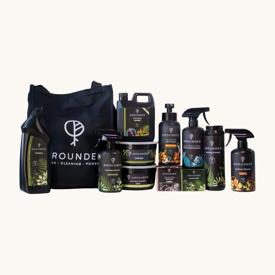 The Grounded range of non-toxic cleaning products and a tote bag.